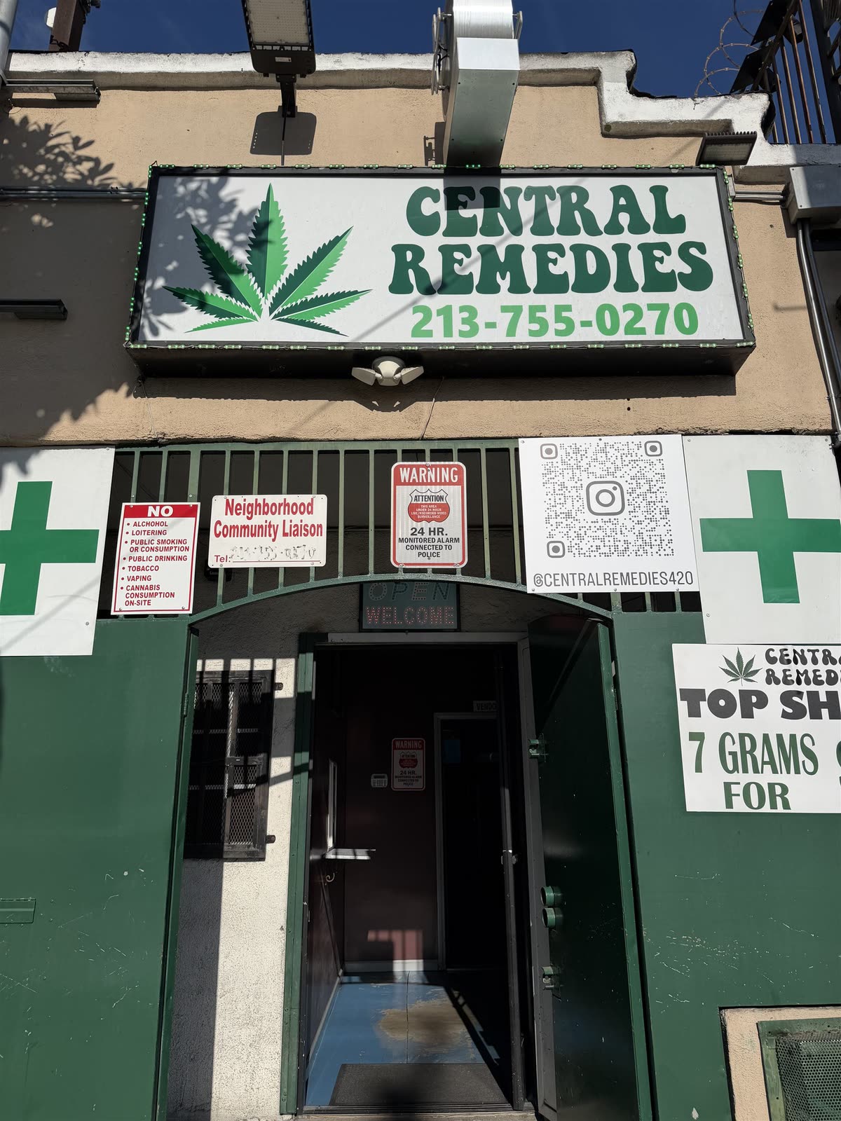 The Central Remedies storefront at 5710 S Central Ave — the green-and-white Central Remedies sign with 213-755-0270, a green cross, and the gated entrance.